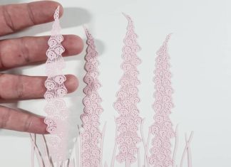 Cut Paper Bubble-Covered Flowers and Ornate Animals Formed From Cut Paper by