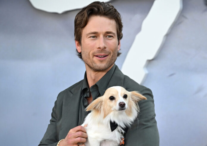 Glen Powell and Brisket at the "Twisters" Premiere in Los Angeles in July 2024
