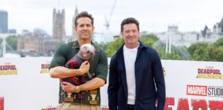 Peggy, aka, "Dogpool", Ryan Reynolds, and Hugh Jackman at the UK Photocall of Marvel Studios' "Deadpool & Wolverine" at IET London in July 2024