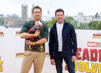 Peggy, aka, "Dogpool", Ryan Reynolds, and Hugh Jackman at the UK Photocall of Marvel Studios' "Deadpool & Wolverine" at IET London in July 2024