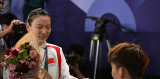 Liu Yuchen proposing to Huang Ya Qiong after the Mixed Doubles Badminton Final at the Paris Olympic Games in August 2024