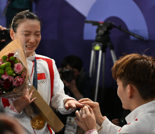 These Viral Moments From the 2024 Paris Olympics Are Pure Gold Liu Yuchen proposing to Huang Ya Qiong after the Mixed Doubles Badminton Final at the Paris Olympic Games in August 2024